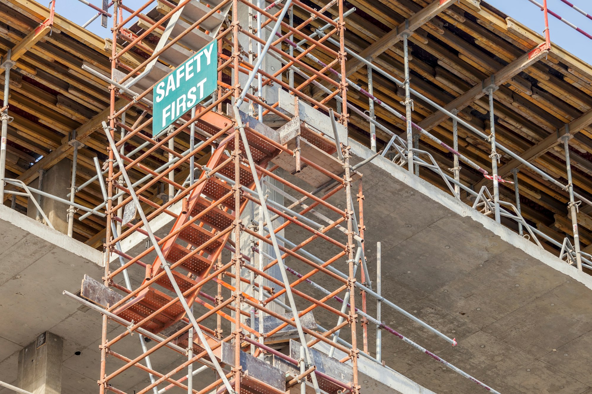 Safety first sign at the construction site